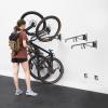 image:imageStoreYourBoard SwivelStow Bike Rack Garage Storage Rack 2 Pack  2 Road amp Gravel Bike Wall Mounts  Heavy Duty Bike Hanger  NoLift Bike Rack Garage Storage Rack  Holds 70 lb Capacity4 Pack