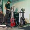 image:imageThe Headliner Guitar Rack 10 Storage Slots Multiple Guitar Floor Stand for Acoustic and Electric Gray Canvas Storage Pockets Hardwood ShelfBlack